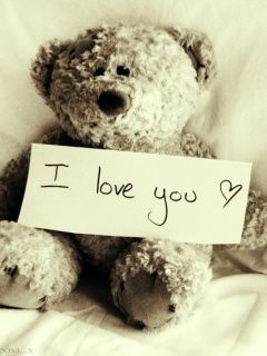 Niedlicher Teddybär mit Liebesbotschaft