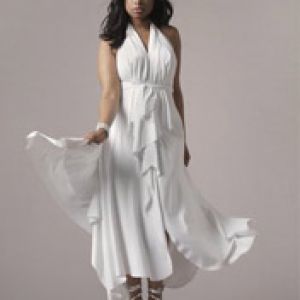Elegante Frau im Weißen Kleid