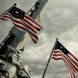 Amerikanische Flaggen und Denkmal