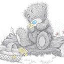 Niedlicher Teddybär mit Blume