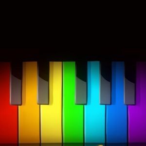 Bunte Klaviertasten und Musiknoten